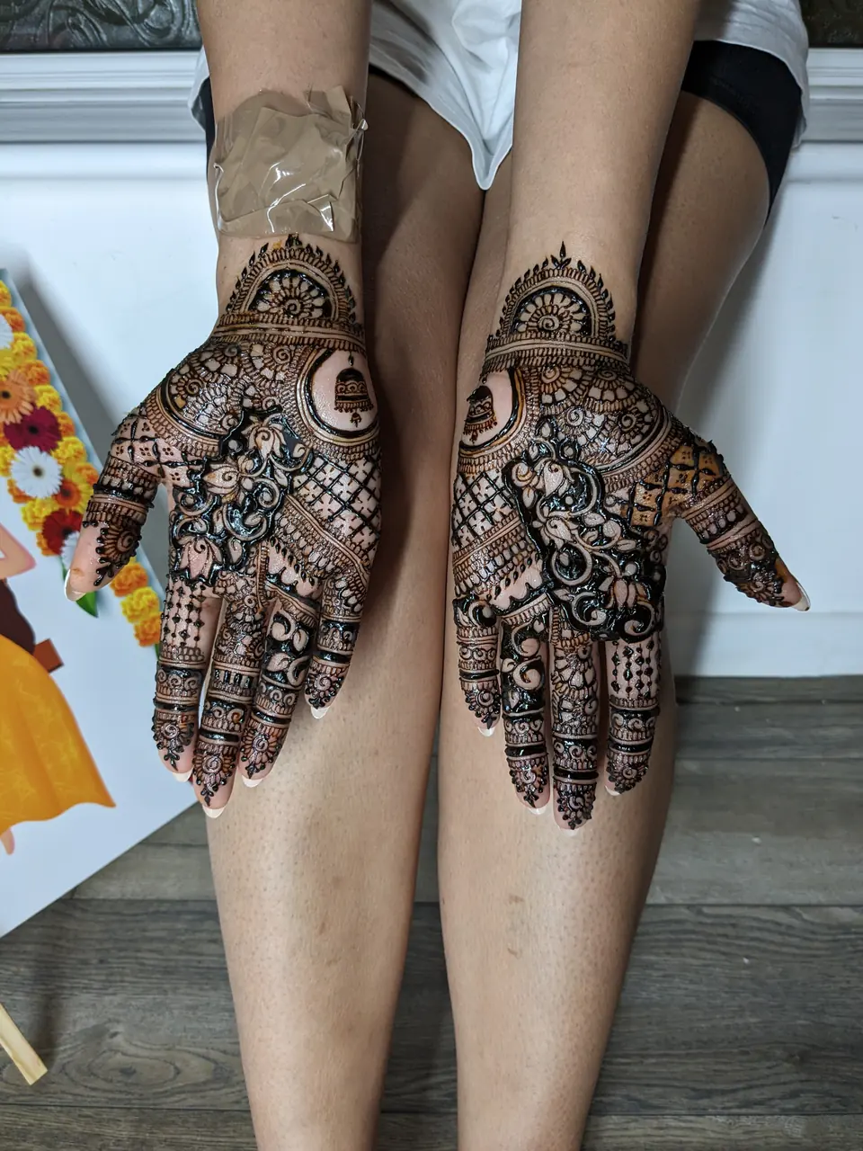 Bridal palm mehndi with mandalas and fine fingertip detail