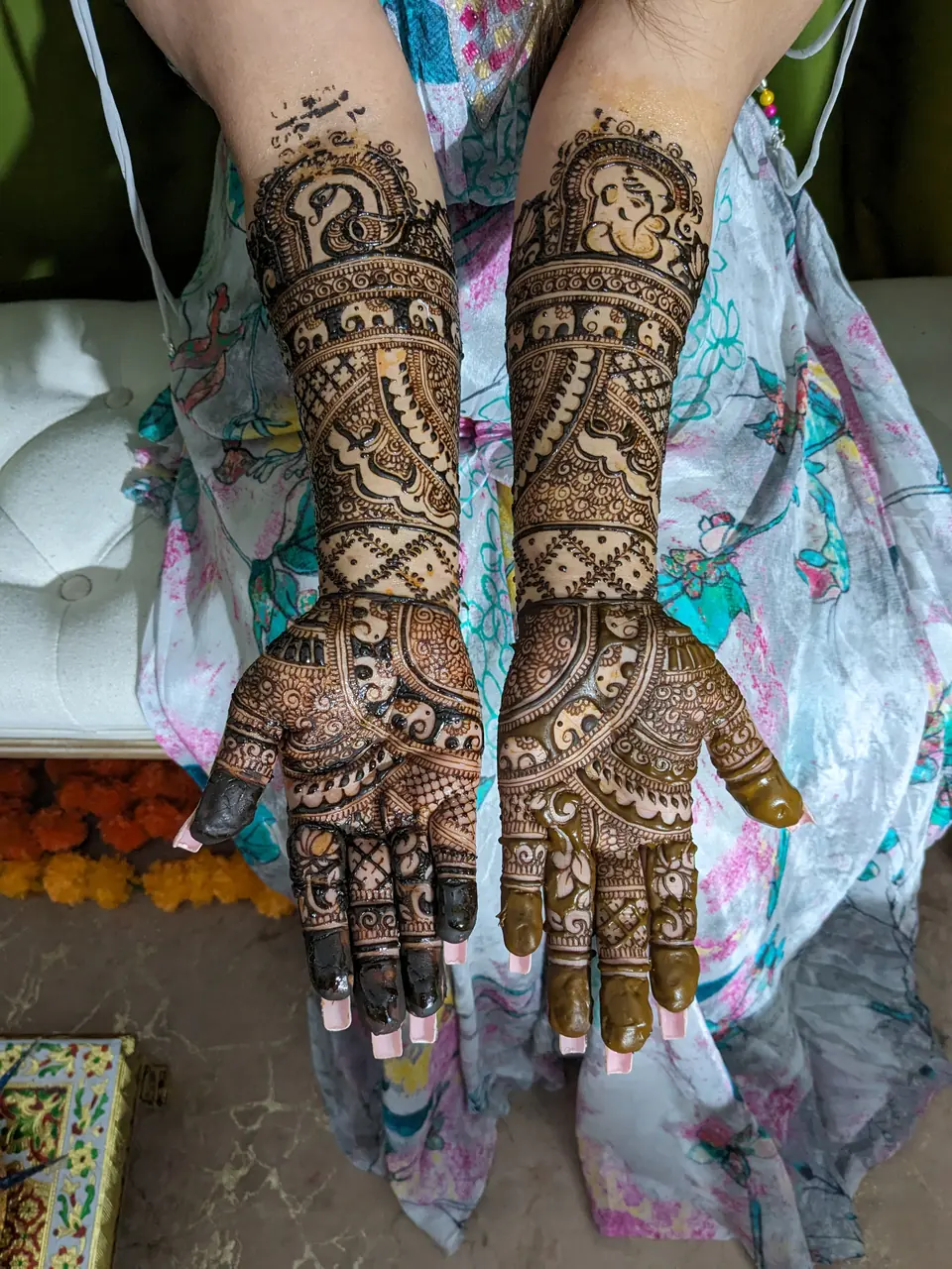 Bridal mehndi with peacocks and wedding procession motifs