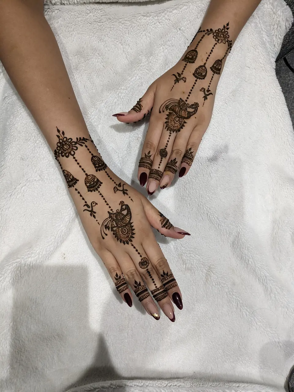 Haath phool inspired henna with hanging chains
